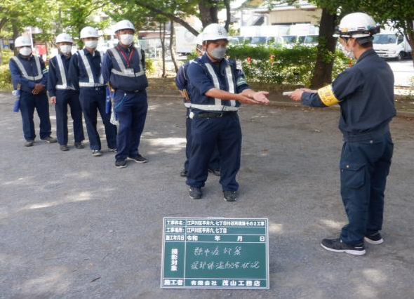 写真：深部体温計の配布