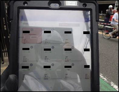 写真：現場でiPadにて管理